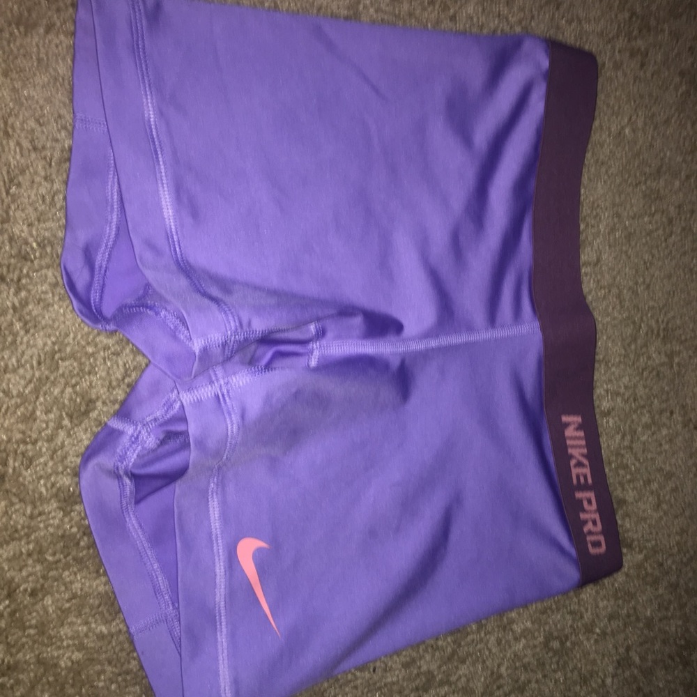 Purple + pink Nike pros, size S